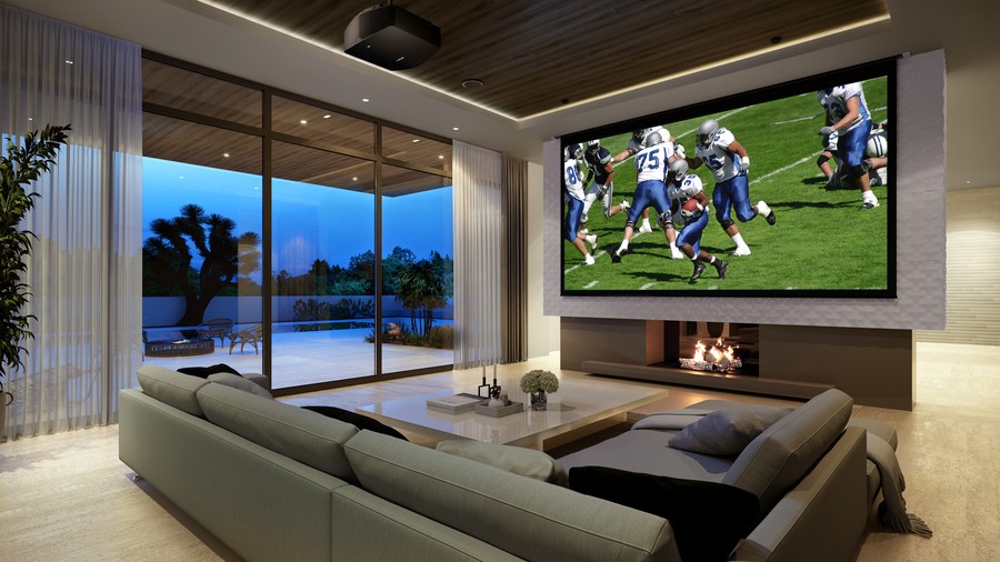 a media room with a projector displaying a football game