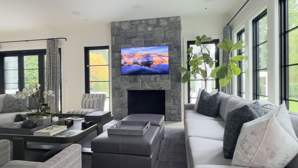 Sophisticated Living Room with Stone Fireplace and Panoramic Views