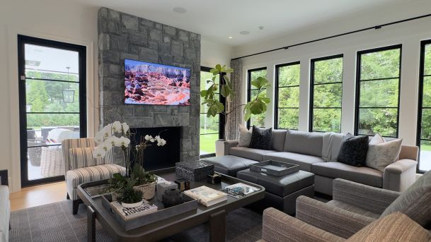 Sophisticated Living Room with Stone Fireplace and Panoramic Views